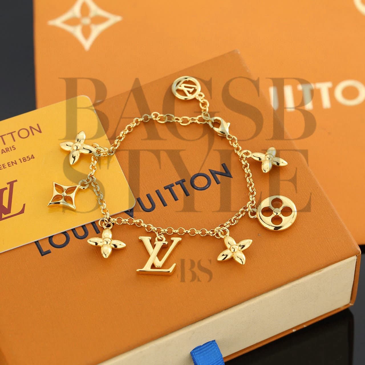 LOUIS VUITTON LV ICONIC CHARMS BRACELET M1376A — Accessories